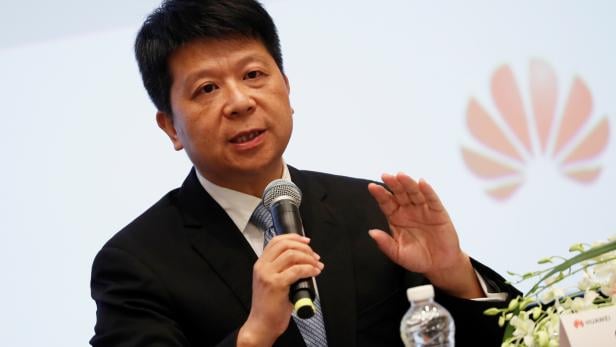 Huawei's rotating Chairman Guo Ping speaks during an news conference in Shenzhen, Guangdong province