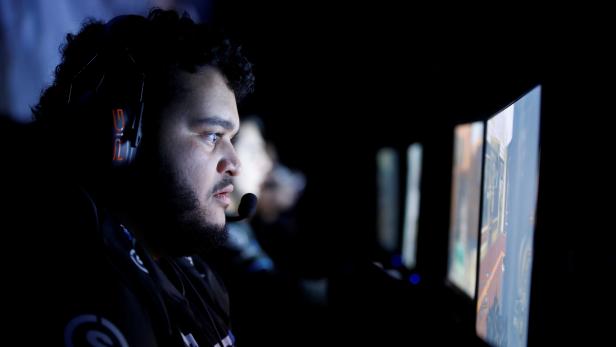 FILE PHOTO: A player from team "SetToDestroyX" competes on his way to winning the finals while playing "Call of Duty: Infinite Warfare" on the Playstation 4, during the Cineplex WorldGaming Canadian Championship Series in Toronto