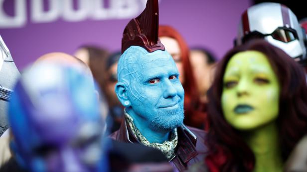 Fans dressed up in costume await the cast members on the red carpet at the world premiere of the film "The Avengers: Endgame" in Los Angeles