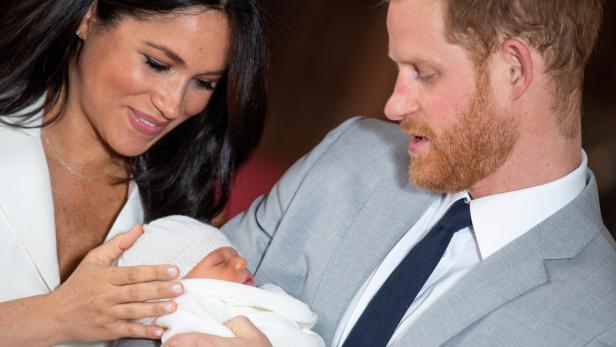 Britain's Prince Harry and Meghan, Duchess of Sussex with their baby son at Windsor Castle