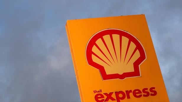 FILE PHOTO: The logo of Royal Dutch Shell is seen at a petrol station in Sint-Pieters-Leeuw