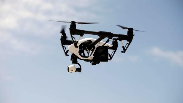FILE PHOTO: A DJI Inspire drone hovers during a drone training session for Somali police in Mogadishu