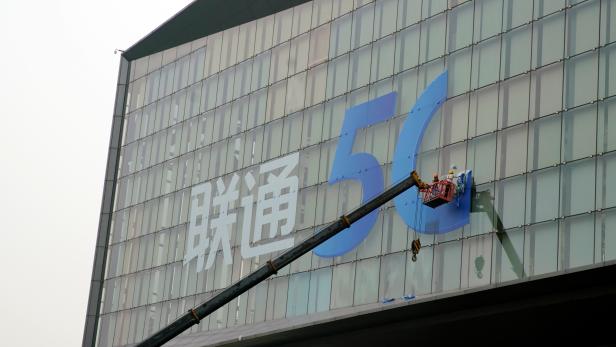 Signs of 5G and China Unicom are seen in Pudong district in Shanghai