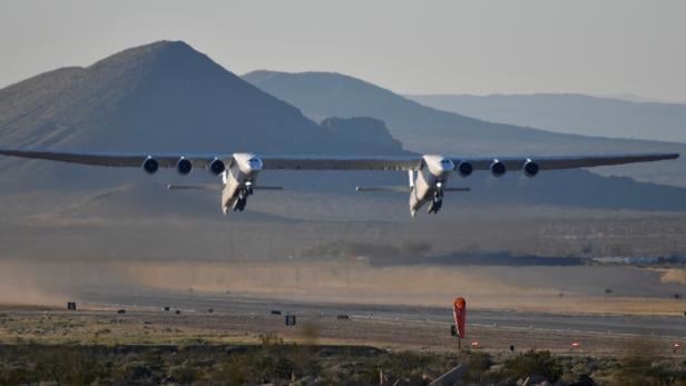 FILE PHOTO: The world's largest airplane, built by the late Paul Allen's company Stratolaunch, makes its first test flight in Mojave