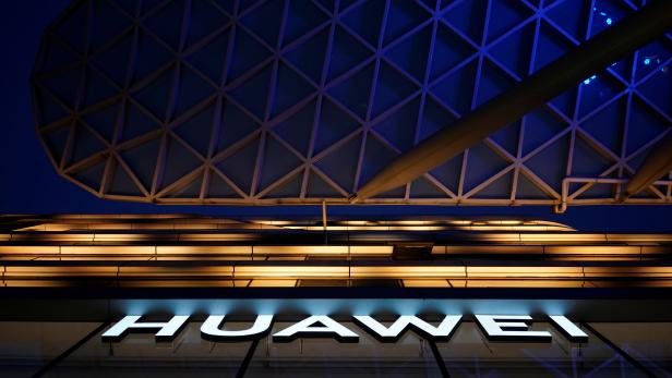 A Huawei company logo is seen at a shopping mall in Shanghai