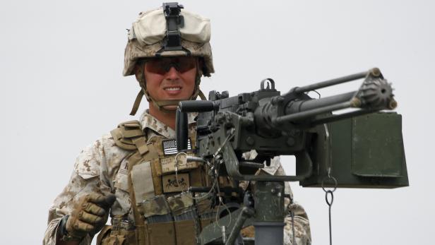 US marine controls his machine gun during a joint military exercise with NATO members, called "Agile Spirit 2015" at the Vaziani military base outside Tbilisi