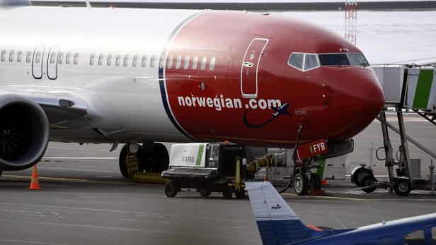 Grounded Boeing 737 Max 8 passenger plane of the Norwegian low-cost airline Norwegian is seen parked on the tarmac at Helsinki Airport in Vantaa