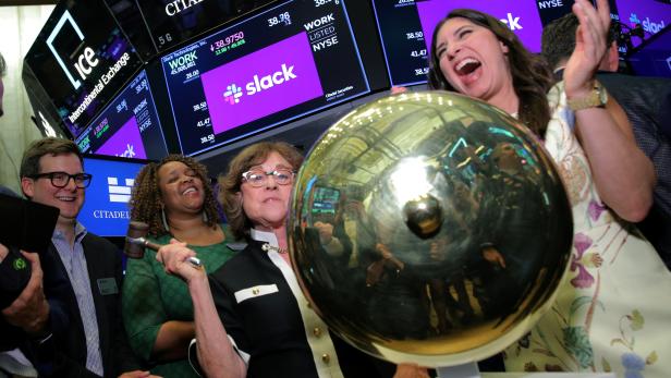 Norma Butterfield rings ceremonial bell during Slack Technologies Inc. direct listing at New York Stock Exchange (NYSE) in New York