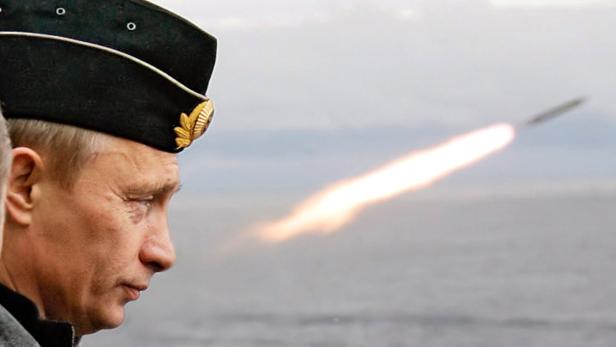 Russian President Putin watches the launch of a missile during naval exercises in Russia's Arctic ...