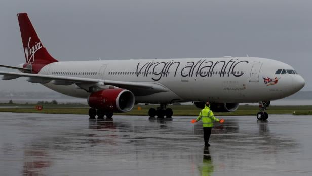 FILE PHOTO: A Virgin Atlantic plane arrives at Liverpool John Lennon Airport in Liverpool northern England.