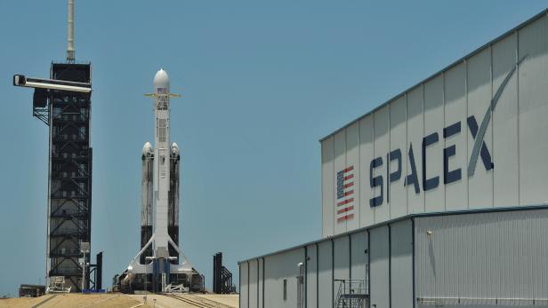 FILE PHOTO: A SpaceX Falcon Heavy rocket, carrying the U.S. Air Forces Space Test Program-2 mission, is shown during launch preparation at the Kennedy Space Center in Cape Canaveral