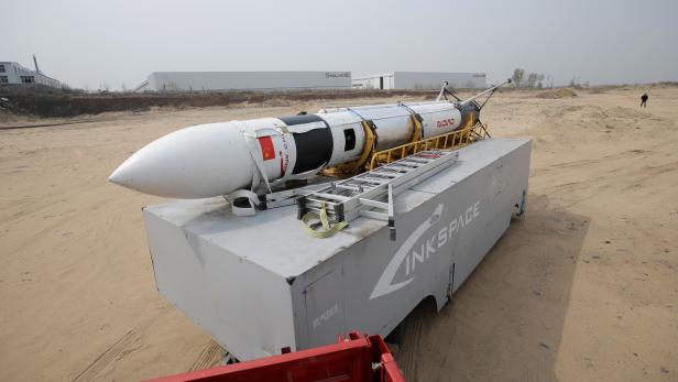 LinkSpaces reusable rocket RLV-T5, also known as NewLine Baby, is transported to a vacant plot of land for a test launch in Longkou