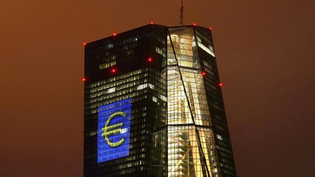 FILE PHOTO: Headquarters of the European Central Bank (ECB) are illuminated with a giant euro sign in Frankfurt