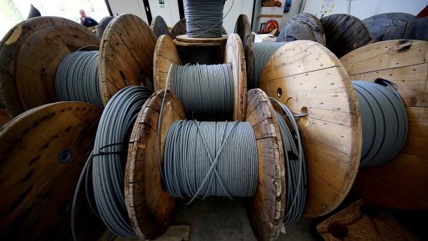 FILE PHOTO: Reels of optical fiber cables are seen in a storage area in Perugia