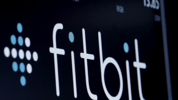 FILE PHOTO: The ticker symbol for Fitbit is displayed at the post where it is traded  on the floor of the NYSE