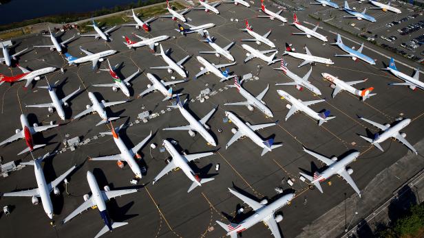 FILE PHOTO: Dozens of grounded Boeing 737 MAX aircraft are seen parked at Boeing Field in Seattle