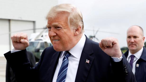 U.S. President Donald Trump gestures after arriving at John Murtha Johnstown-Cambria County Airport in Johnstown after arriving in Pennsylvania