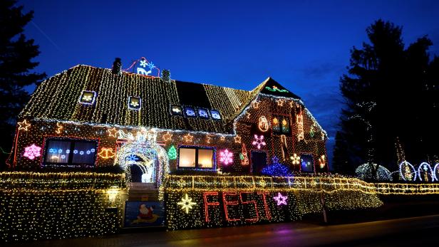 A house is illuminated ahead of Christmas in Calle, Lower Saxony