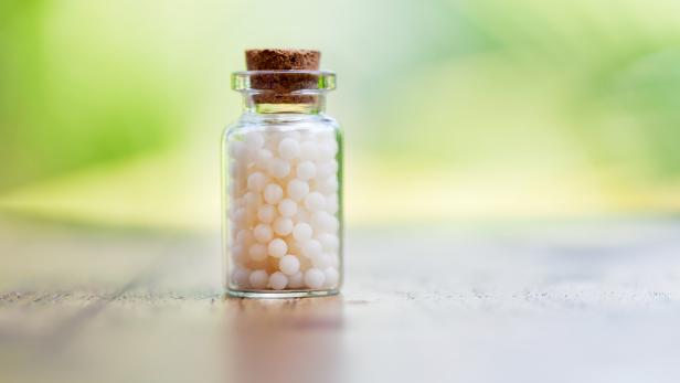 Homeopathy - A homeopathy concept with homeopathic medicine