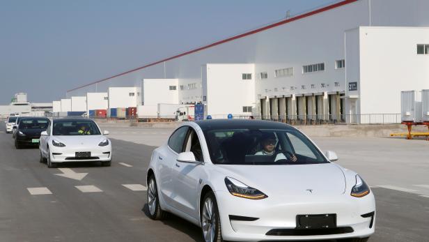 FILE PHOTO: China-made Tesla Model 3 vehicles are seen at the Shanghai Gigafactory of the U.S. electric car maker in Shanghai