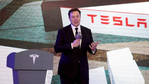 FILE PHOTO: Tesla Inc CEO Elon Musk speaks at an opening ceremony for Tesla China-made Model Y program in Shanghai