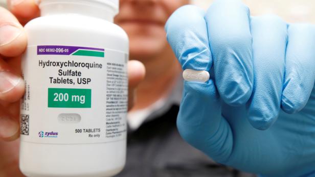 FILE PHOTO: The drug hydroxychloroquine, pushed by U.S. President Donald Trump and others in recent months as a possible treatment to people infected with the coronavirus disease (COVID-19), is displayed by a pharmacist in Provo
