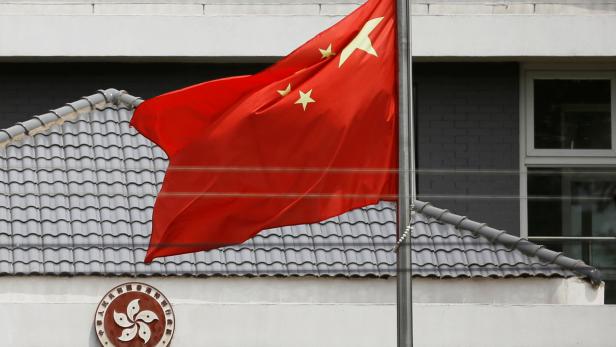 Chinese flag flutters at the office of the Government of the Hong Kong Special Administrative Region in Beijing