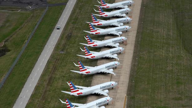 American Airlines 737 Max passenger planes are parked on the tarmac at Tulsa International Airport in Tulsa