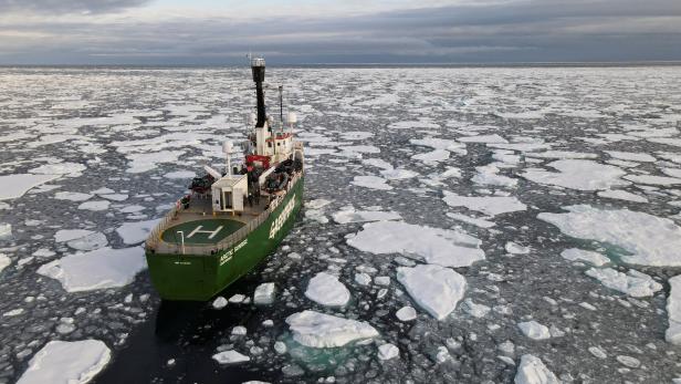 FILE PHOTO: Greenpeace's Arctic Sunrise ship navigates through floating ice in the Arctic Ocean