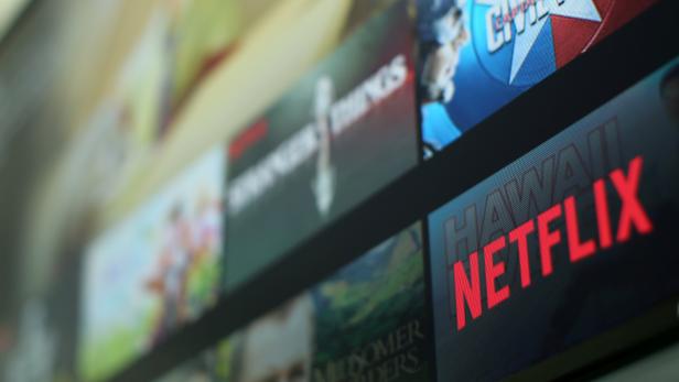 FILE PHOTO: The Netflix logo is pictured on a tevevison in this illustration photograph taken in Encinitas, California