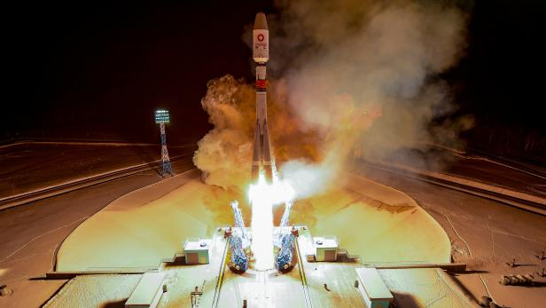 A rocket booster with OneWeb satellites blasts off at the Vostochny Cosmodrome in the Russian Far East