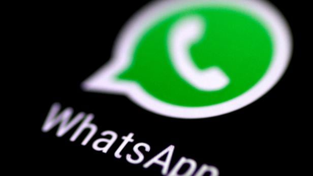 FILE PHOTO: The WhatsApp messaging application is seen on a phone screen