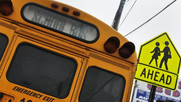 A school bus sits parked along a street in the Queens borough of New York January 16, 2013. For the first time in 34 years, New York City bus drivers went on strike, stranding up to 152,000 students in the nation&#039;s largest public school system on sleet-soaked Wednesday morning. REUTERS/Shannon Stapleton (UNITED STATES - Tags: EDUCATION CIVIL UNREST BUSINESS EMPLOYMENT)