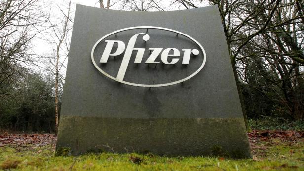 FILE PHOTO: The Pfizer logo is seen at their UK commercial headquarters in Walton Oaks