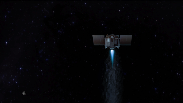 Die NASA-Sonde Osiris-Rex mit Gesteinsproben vom Asteroiden Bennu (links unten im Hintergrund) auf ihrem Flug durch den Weltraum