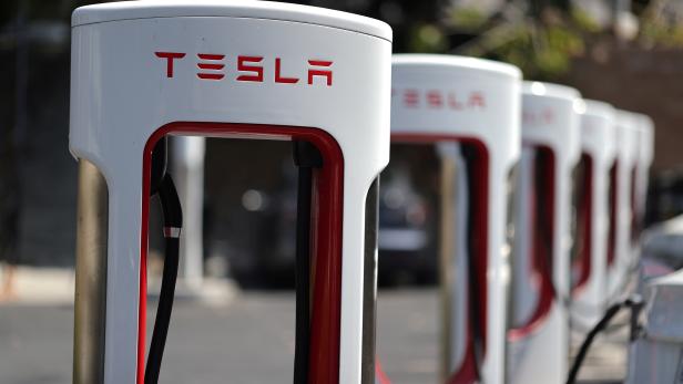 FILE PHOTO: A Tesla SuperCharger station is seen in Los Angeles