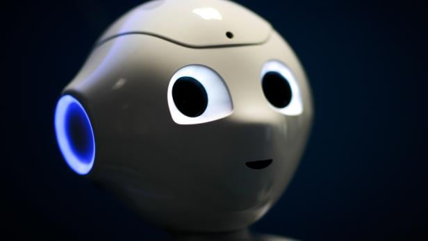 FILE PHOTO: French robot Pepper that detects non-masked faces helps enforce mask-wearing