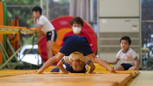 Young gymnasts train hard in Japan