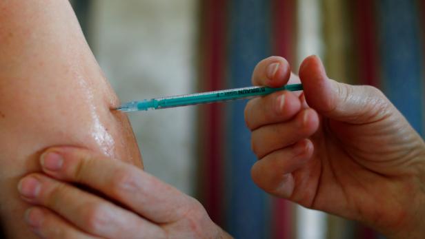 FILE PHOTO: COVID-19 Vaccination of patients at their homes in Cologne