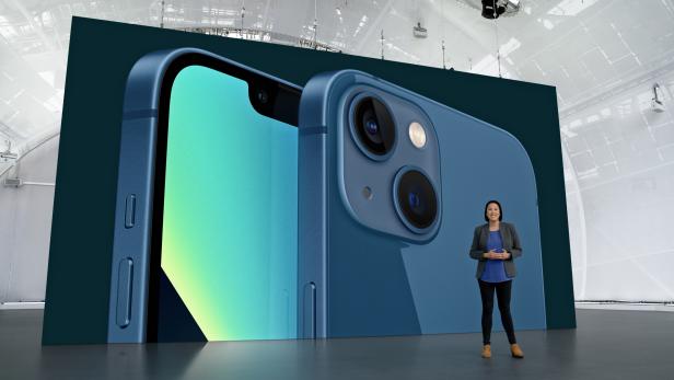 Apples Kaiann Drance showcases the new iPhone 13 during a special event