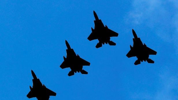 FILE PHOTO: The U.S. Air Force F-22 fighter jets fly in formation during 4th of July flyover over Hudson River past New York City and New Jersey