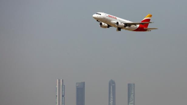 FILE PHOTO: An Iberia Airbus A319 airplane takes off from the Adolfo Suarez Madrid-Barajas airport