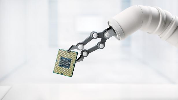 Robot Arm Holding CPU
