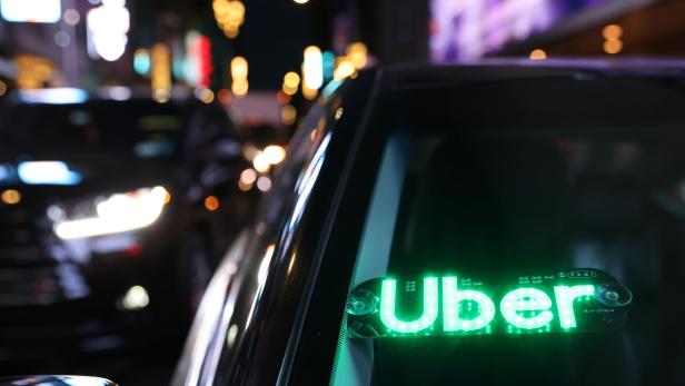 The logo for Uber Technologies is seen on a vehicle in Manhattan, New York City