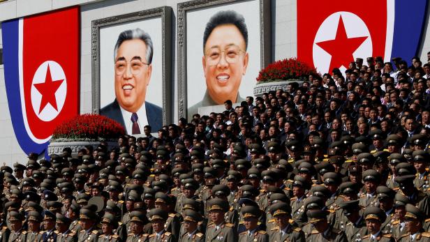 FILE PHOTO: North Korean senior military officials watch a parade