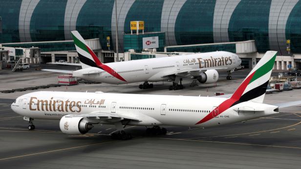 FILE PHOTO: Emirates Boeing 777 planes at Dubai International Airport
