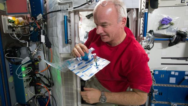 Astronauts collect samples for blood research at the International Space Station