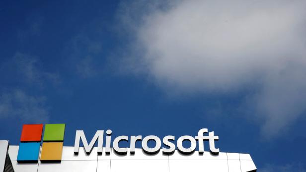 FILE PHOTO: A Microsoft logo is seen next to a cloud in Los Angeles