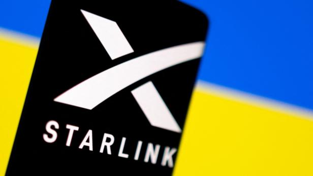 Illustration shows Starlink logo and Ukraine flag