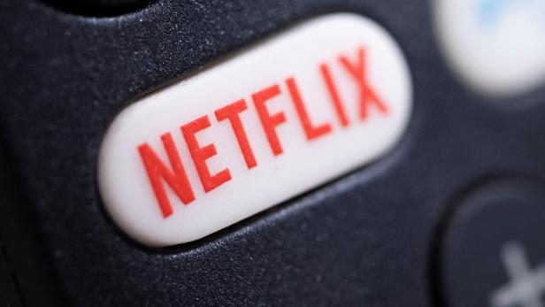 FILE PHOTO: The Netflix logo is seen on a TV remote controller, in this illustration
